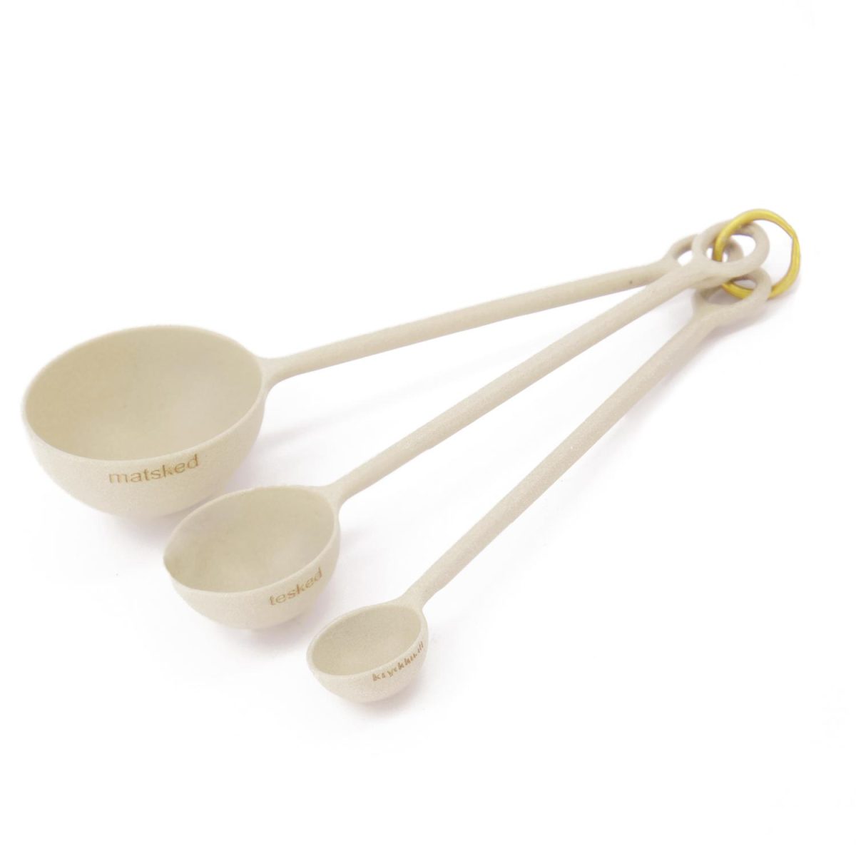 Måleskjeer i metall beige